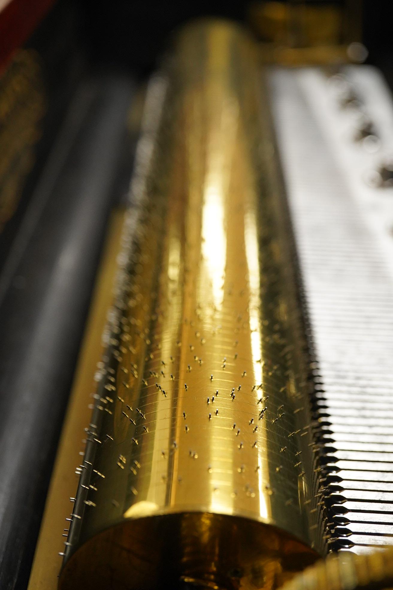 A late 19th century inlaid and ebonised rosewood Swiss cylinder music box by Nicole Freres, Geneve, and retailed by Alfred Hays, 4, Royal Exchange Buildings, complete with all teeth to the comb, cylinder 27.8cm long, the